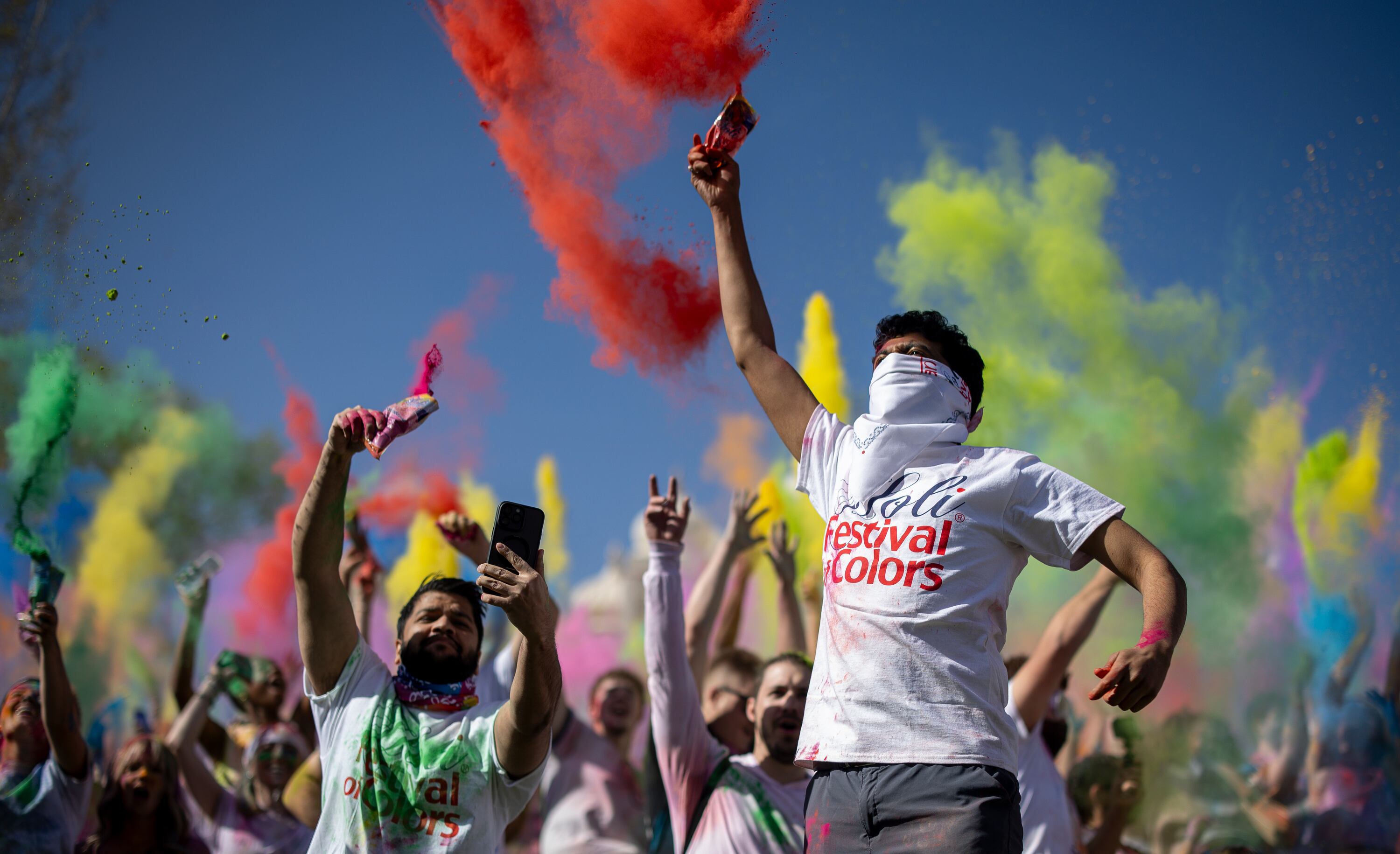 Attendees participate in a color throw as people celebrate Holi at the Sri Sri Radha Krishna Temple in Spanish Fork on Saturday.