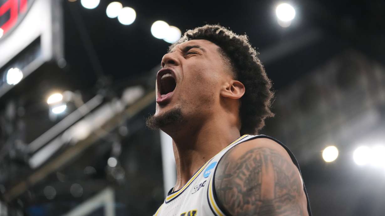 Michigan's Yaxel Lendeborg (23) celebrates during the second half in the Elite Eight of the NCAA college basketball tournament against Tennessee, Sunday, March 29, 2026, in Chicago.