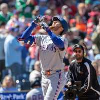 Gore wins 1st start, Nimmo and McCutchen hit 1st homers for Rangers in blowout of Phillies