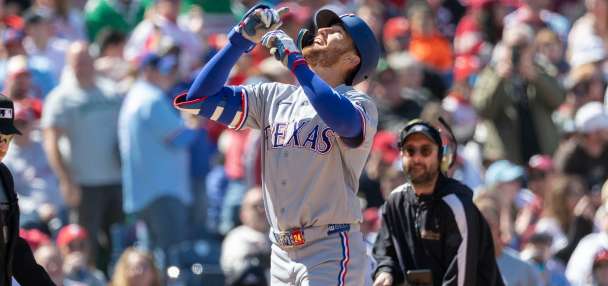 Gore wins 1st start, Nimmo and McCutchen hit 1st homers for Rangers in blowout of Phillies