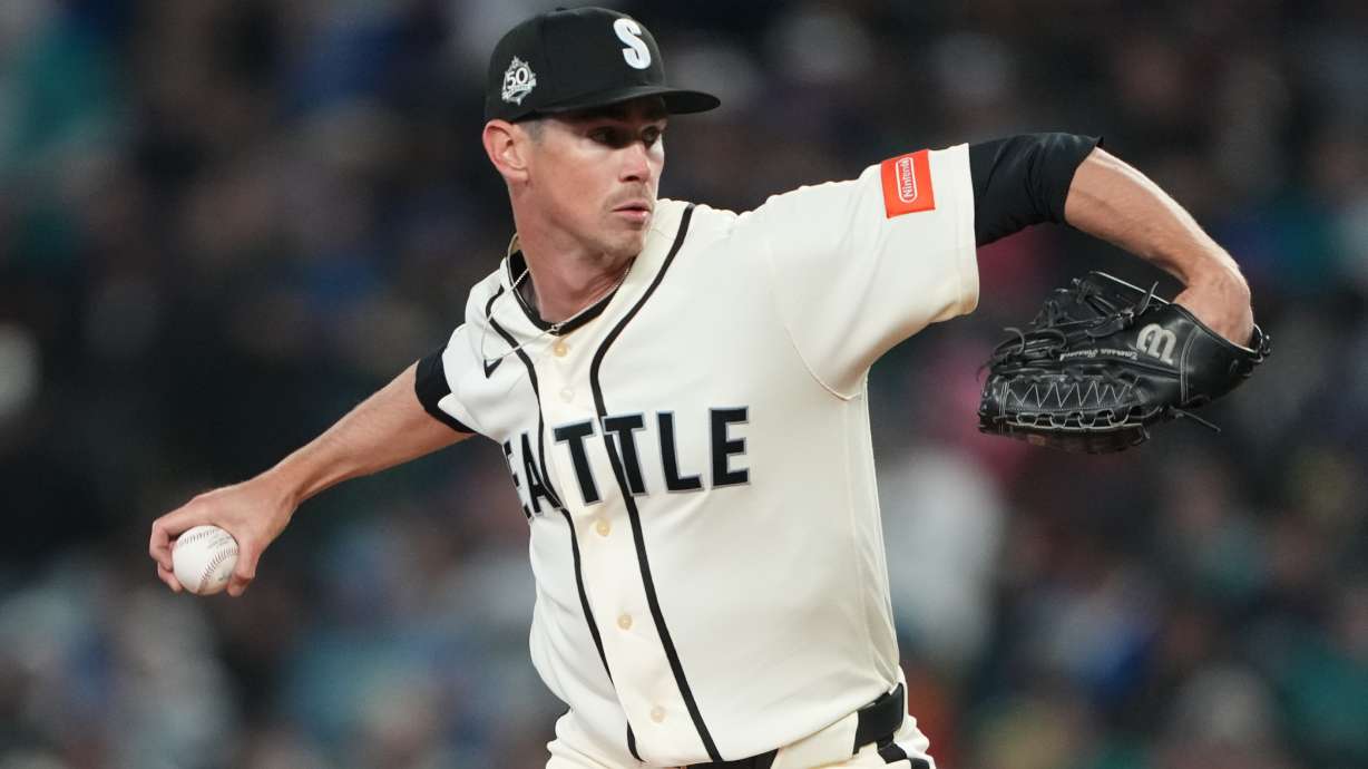Seattle Mariners starting pitcher Emerson Hancock throws against the Cleveland Guardians during the third inning of a baseball game, Sunday, March 29, 2026, in Seattle.