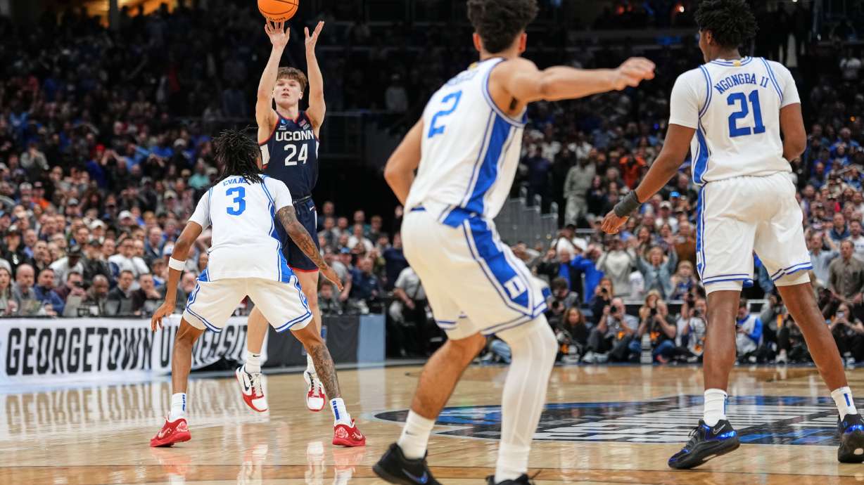 UConn guard Braylon Mullins (24) scores the winning basket during the second half against Duke in the Elite Eight of the NCAA college basketball tournament, Sunday, March 29, 2026, in Washington.