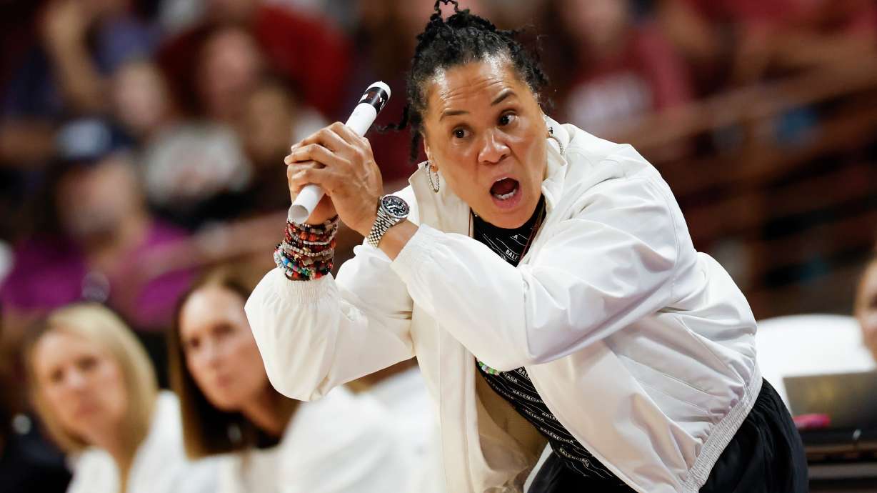 South Carolina head coach Dawn Staley directs her team against Southern California during the first half in the second round of the NCAA college basketball tournament, Monday, March 23, 2026, in Columbia, S.C.