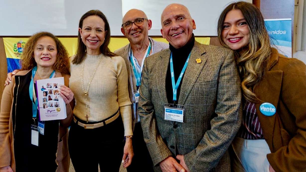 Norely López, left, stands next to Venezuelan opposition leader Maria Corina Machado and others from Utah's Venzeualan community at a Feb. 28 meeting in Washington, D.C., of Venezuelans from around the United States.
