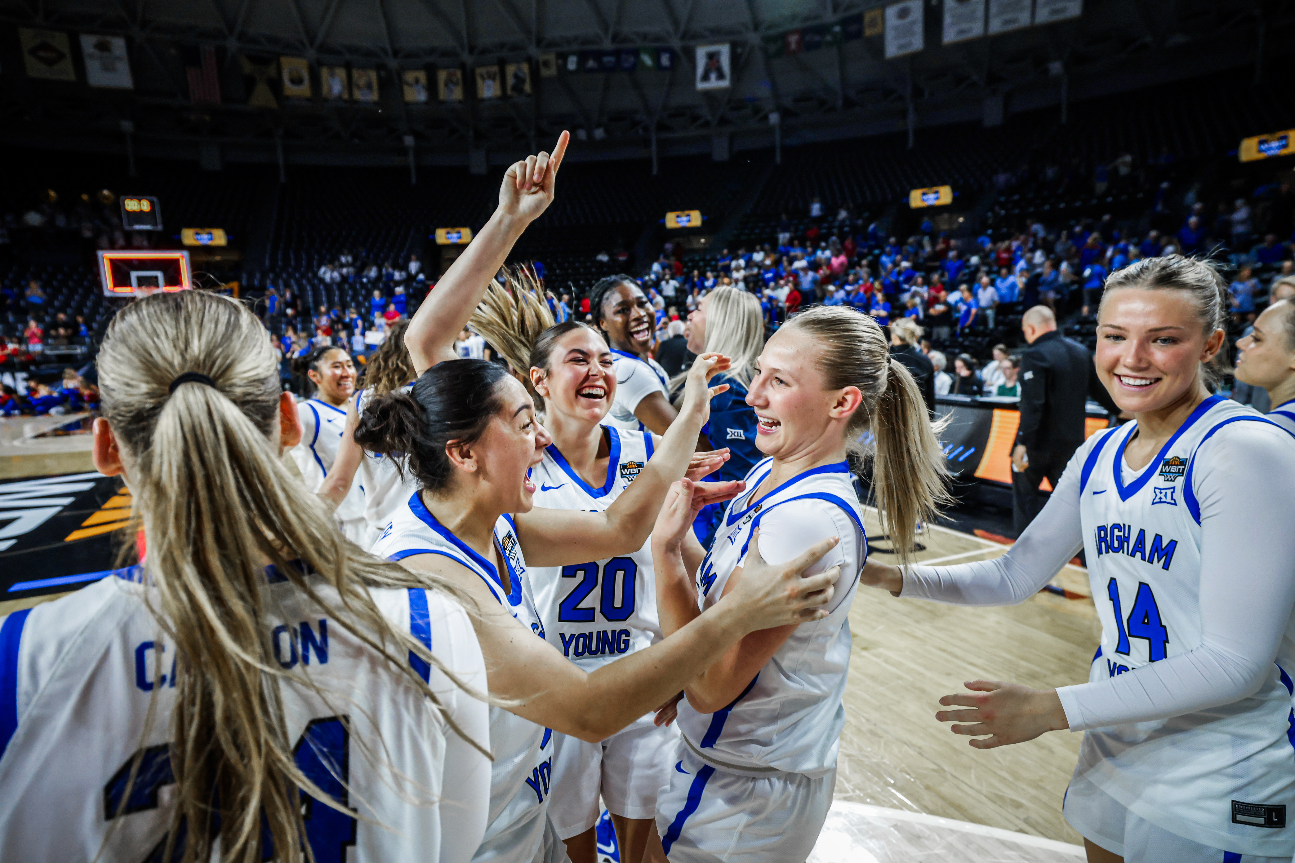 BYU women's basketball celebrates after a WBIT semifinal game against Kansas, Monday, March 30, 2026 in Wichita, Kansas.