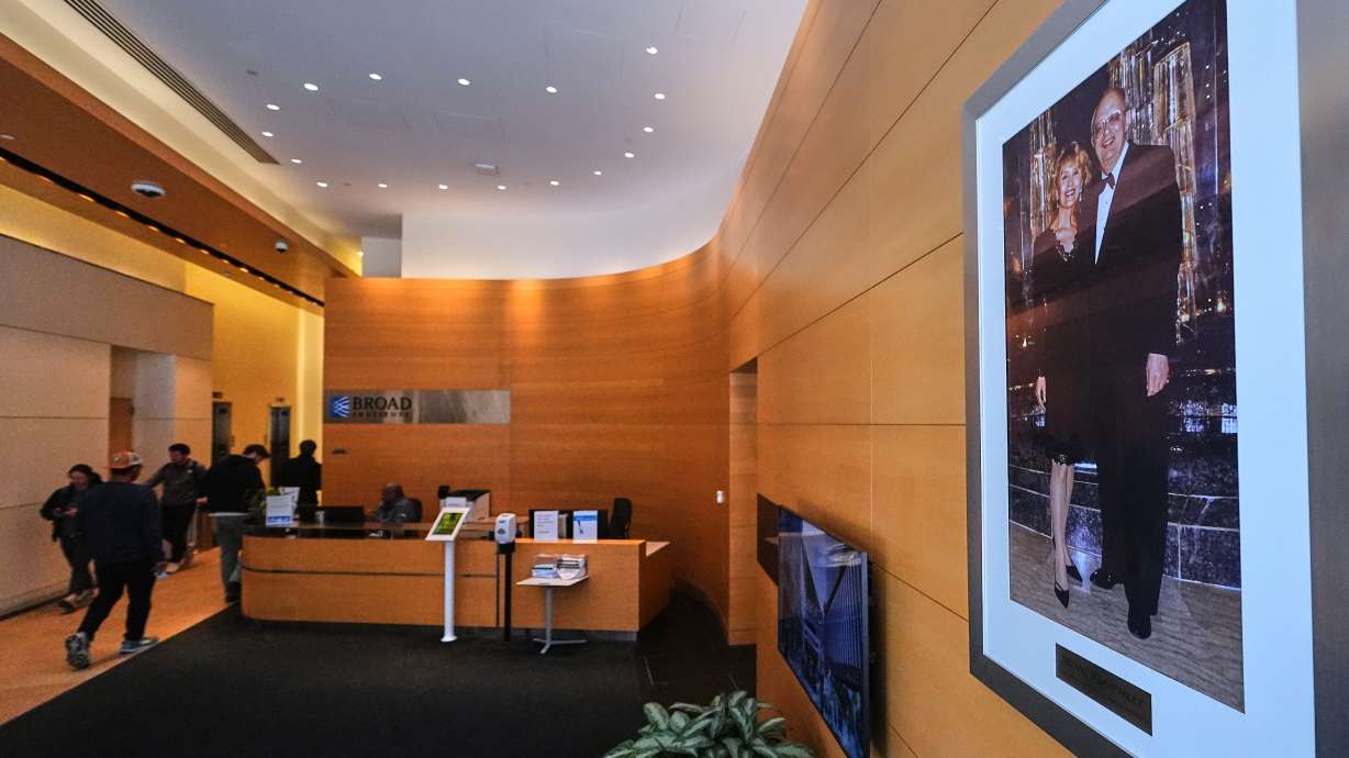 A portrait of Ted and Vada Stanley hangs in the lobby of the Broad Institute, which houses the Stanley Center for Psychiatric Research, March 17, in Cambridge, Mass.