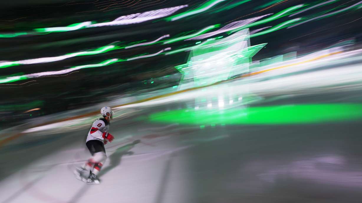 New Jersey Devils defenseman Johnathan Kovacevic takes the ice prior to an NHL hockey game against the Dallas Stars Tuesday, March 24, 2026, in Dallas.