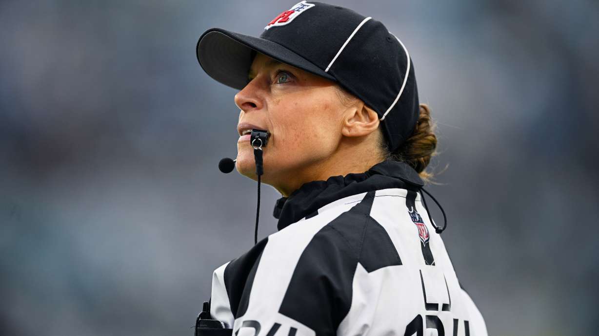 FILE - Line judge Robin DeLorenzo looks on during the second half of an NFL football game between the Jacksonville Jaguars and the Tennessee Titans, Dec. 29, 2024, in Jacksonville, Fla.