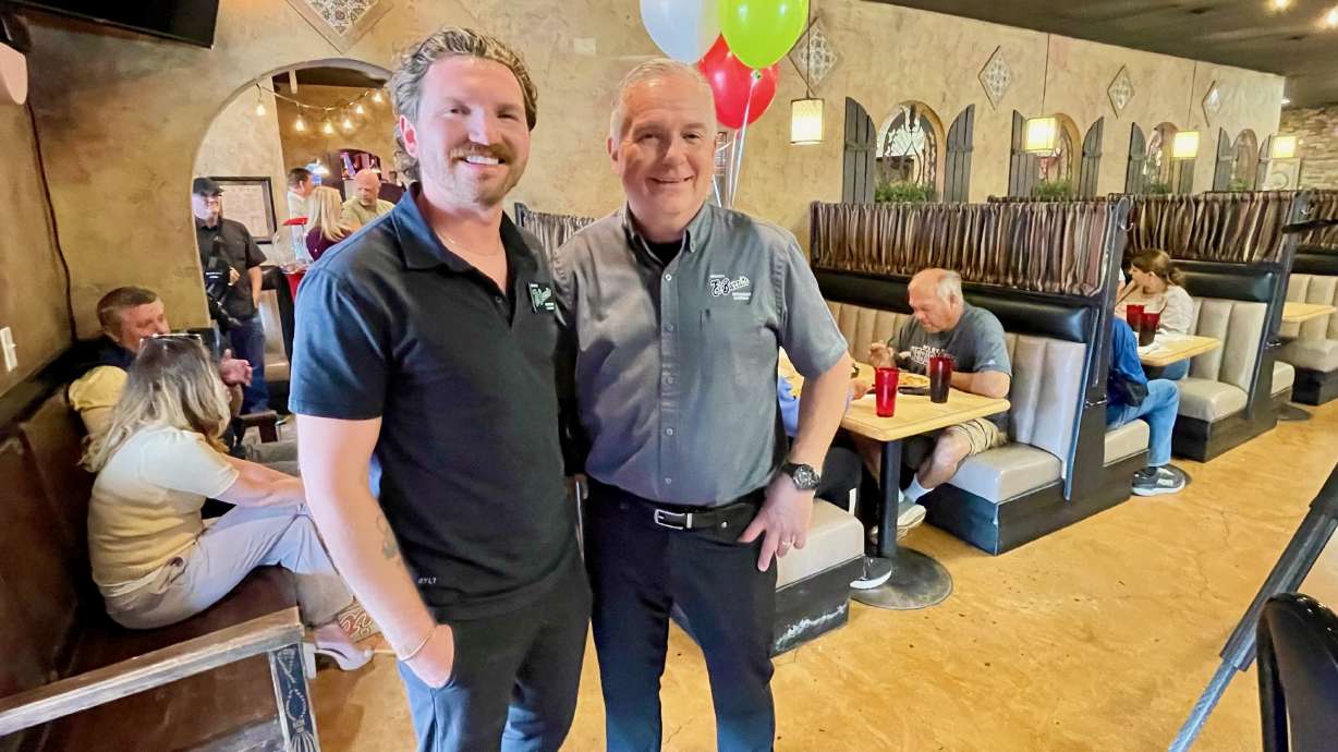 Manuel's El Burrito operators Alec Gallegos, left, and his father Manuel Gallegos Jr. held a small celebration on Tuesday to mark 50 years in business for the Clearfield Mexican restaurant.