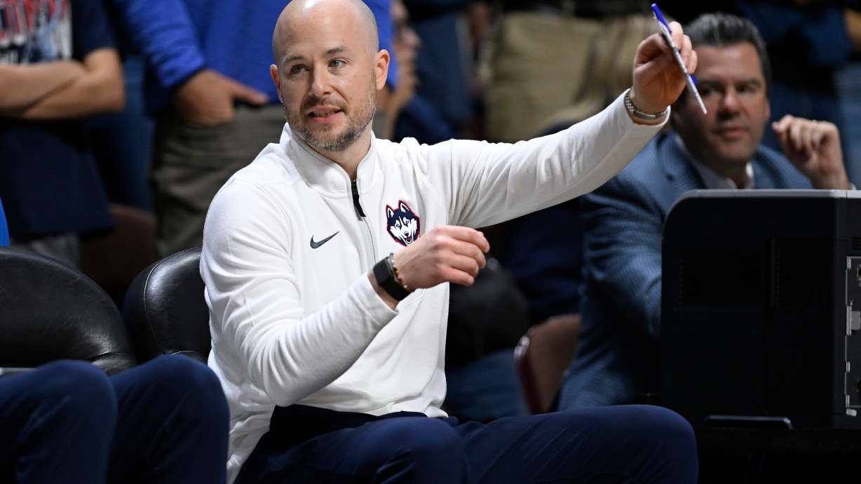 FILE - UConn assistant coach Luke Murray gestures during the first half of an exhibition NCAA basketball game against Boston College, Oct. 13, 2025, in Uncasville, Conn.