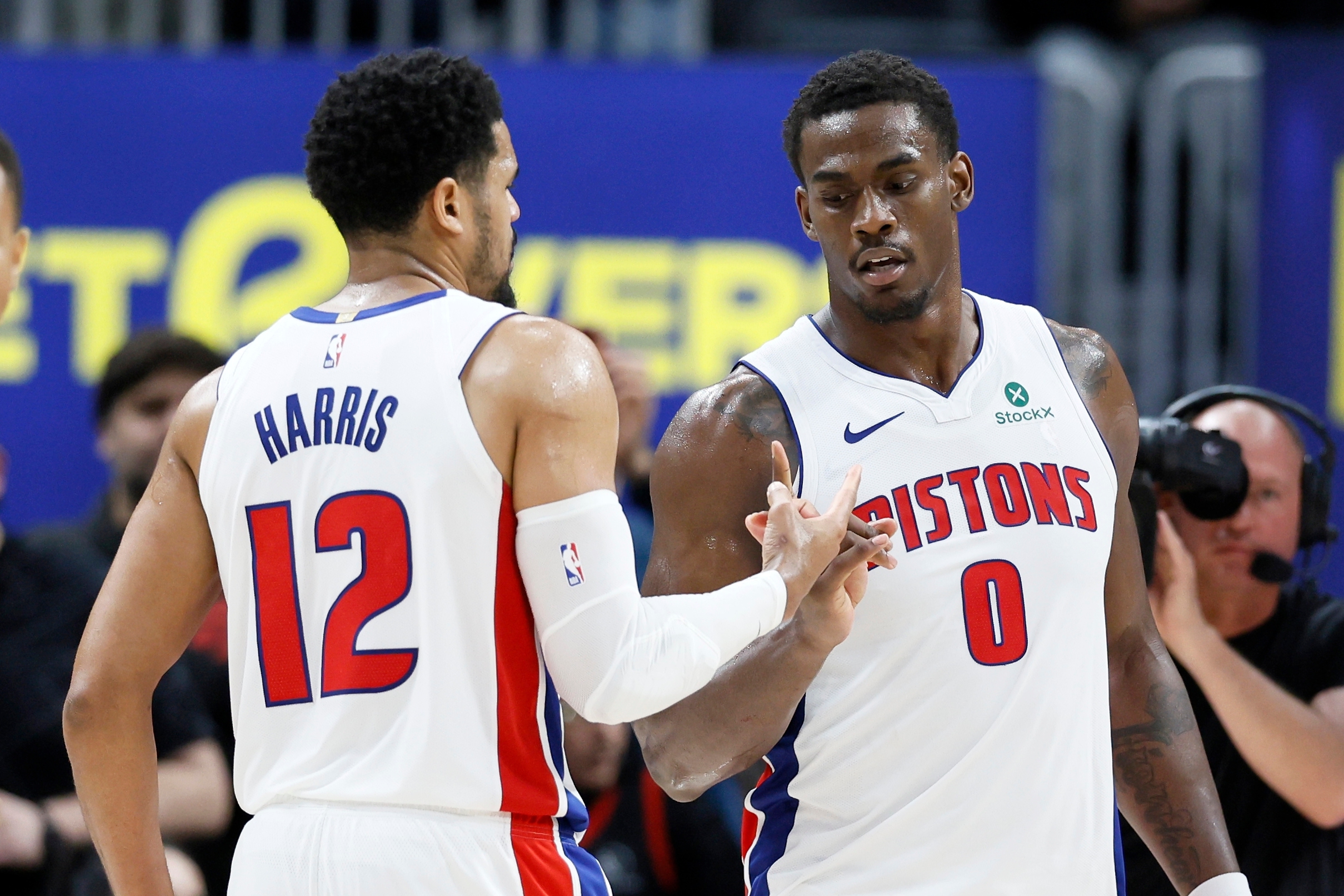 Detroit Pistons forward Tobias Harris (12) celebrates with center Jalen Duren (0) after a win over the Toronto Raptors in an NBA basketball game Tuesday, March 31, 2026, in Detroit.