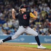 Ohtani throws 6 scoreless innings in a drizzly debut on mound as Dodgers beat Guardians 4-1