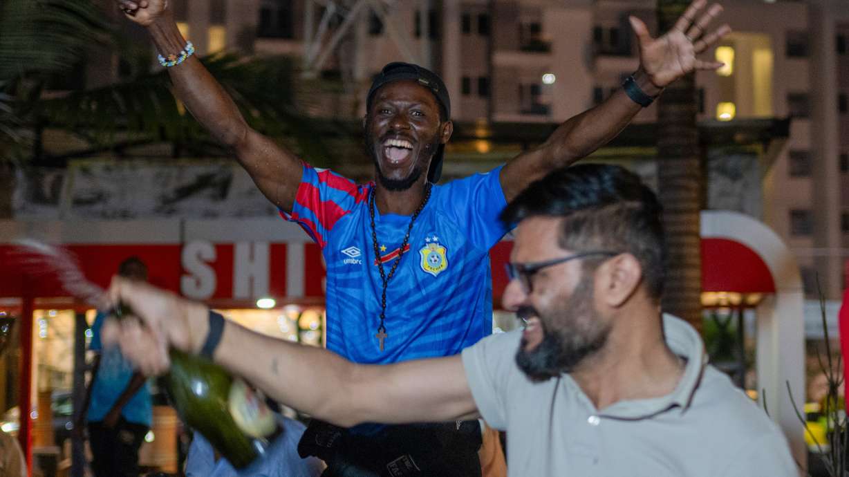 Congolese football fans celebrate in Goma, Democratic Republic of the Congo, as their team qualified for World Cup by winning over Jamaica in an intercontinental playoff, Wednesday, April 1, 2026.