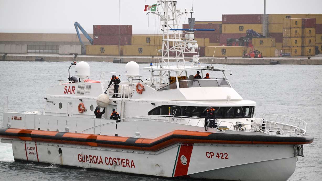 An Italian coast guard ship arrives in the harbor of Bari, in southern Italy, on Oct. 19, 2024. The Italian Coast Guard found 19 people dead and rescued 58 others after intercepting a dinghy filled with migrants that was in distress.