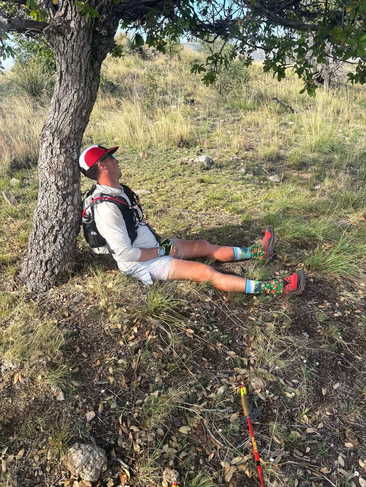 Michael McKnight rests against a tree during a brief nap while doing the Arizona Monster 300. Utah native Michael McKnight overcame mental and physical hurdles to break the record for the Arizona Monster 300, a 304-mile race through the Sonoran Desert.