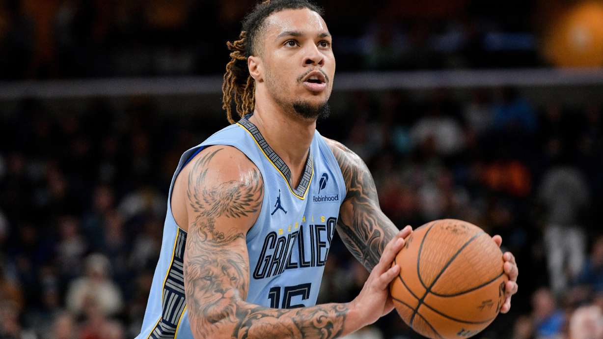 FILE - Memphis Grizzlies forward Brandon Clarke (15) shoots a free throw during an NBA Cup basketball game against the Denver Nuggets, Nov. 19, 2024, in Memphis, Tenn.