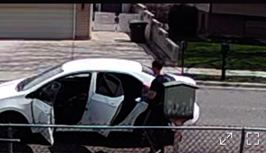 A man is pictured taking items from “Angela’s Little Free Library” in West Valley City on Tuesday, in this screenshot from a Ring camera. Jensen received an overwhelming community response to the theft.