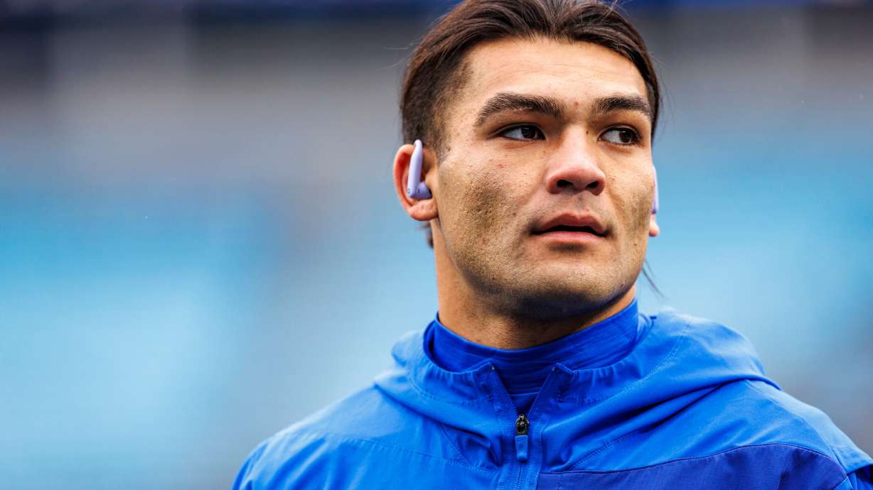 Los Angeles Rams wide receiver Puka Nacua (12) warms up before an NFL football game against the Carolina Panthers, Nov. 30, 2025, in Charlotte, N.C.