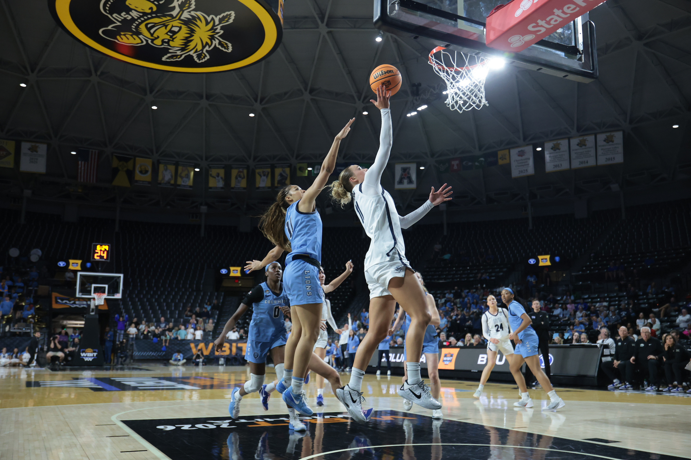 BYU guard Delaney Gibb drives to the rim during the WBIT championship game against Columbia, Wednesday, April 1, 2026 at Charles Koch Arena in Wichita, Kansas.