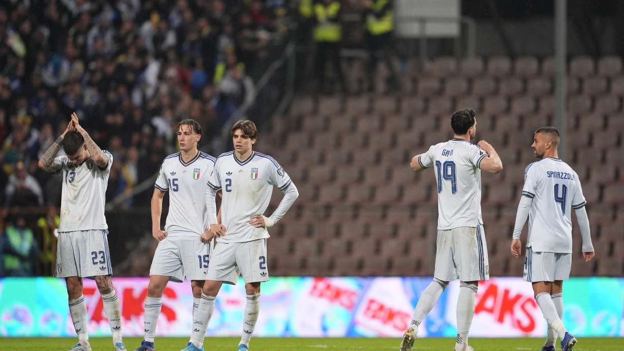 Italy players react after losing in a World Cup qualifying playoff final soccer match between Bosnia and Italy in Zenica, Bosnia, Tuesday, March 31, 2026.