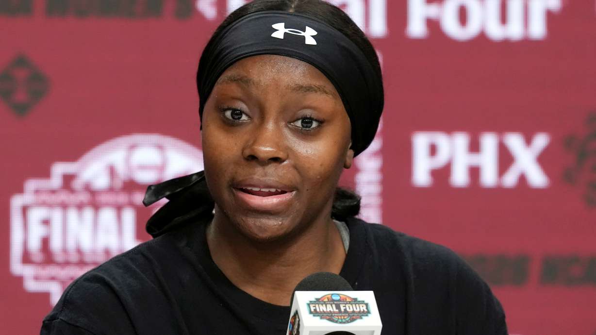 South Carolina's Raven Johnson answers a question during a new conference prior to the national semifinals at the Women's Final Four of the NCAA college basketball tournament, Thursday, April 2, 2026, in Phoenix.