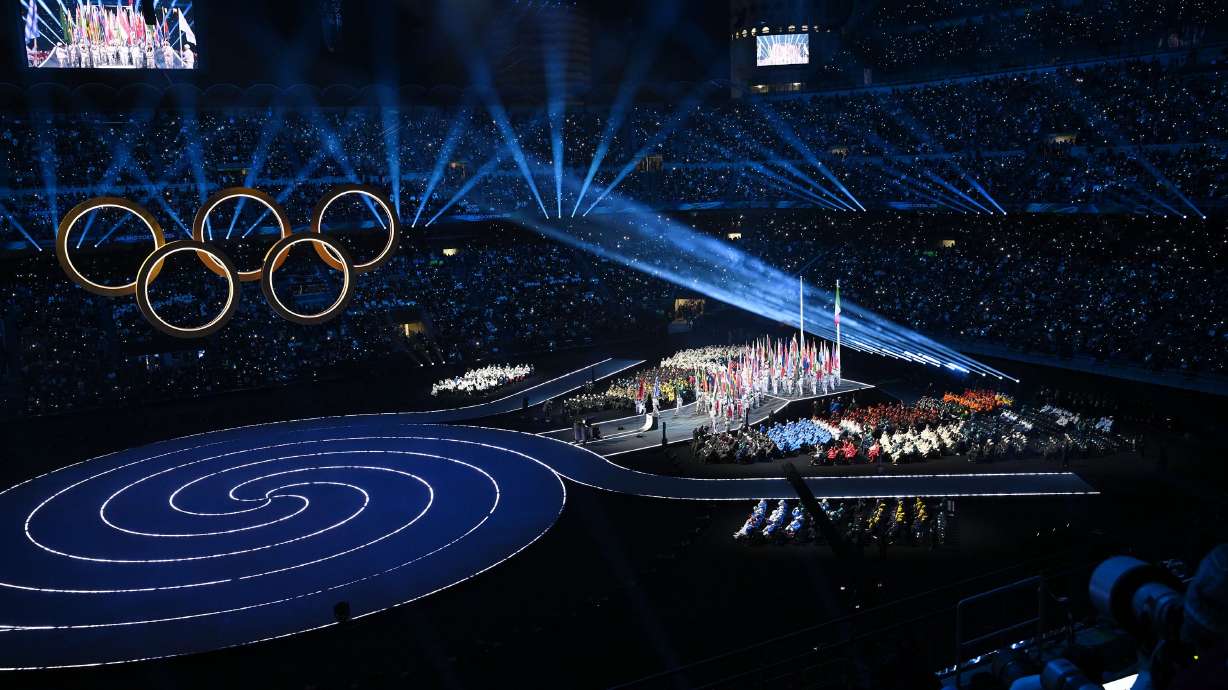 Opening Ceremonies for the 2026 Milan Cortina Winter Olympics in Milan, Italy, on Feb. 6. One of the most lasting lessons organizers of Utah's 2034 Winter Games learned may have come from seeing some paper plates displayed on a wall in a Milan classroom.