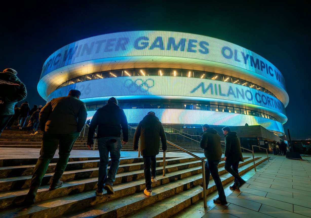 Hockey fans walk to watch Team USA women and Switzerland’s women at Milano Rho Ice Hockey Arena in the 2026 Milan Cortina Winter Olympics in Milan, Italy, on Feb. 10.