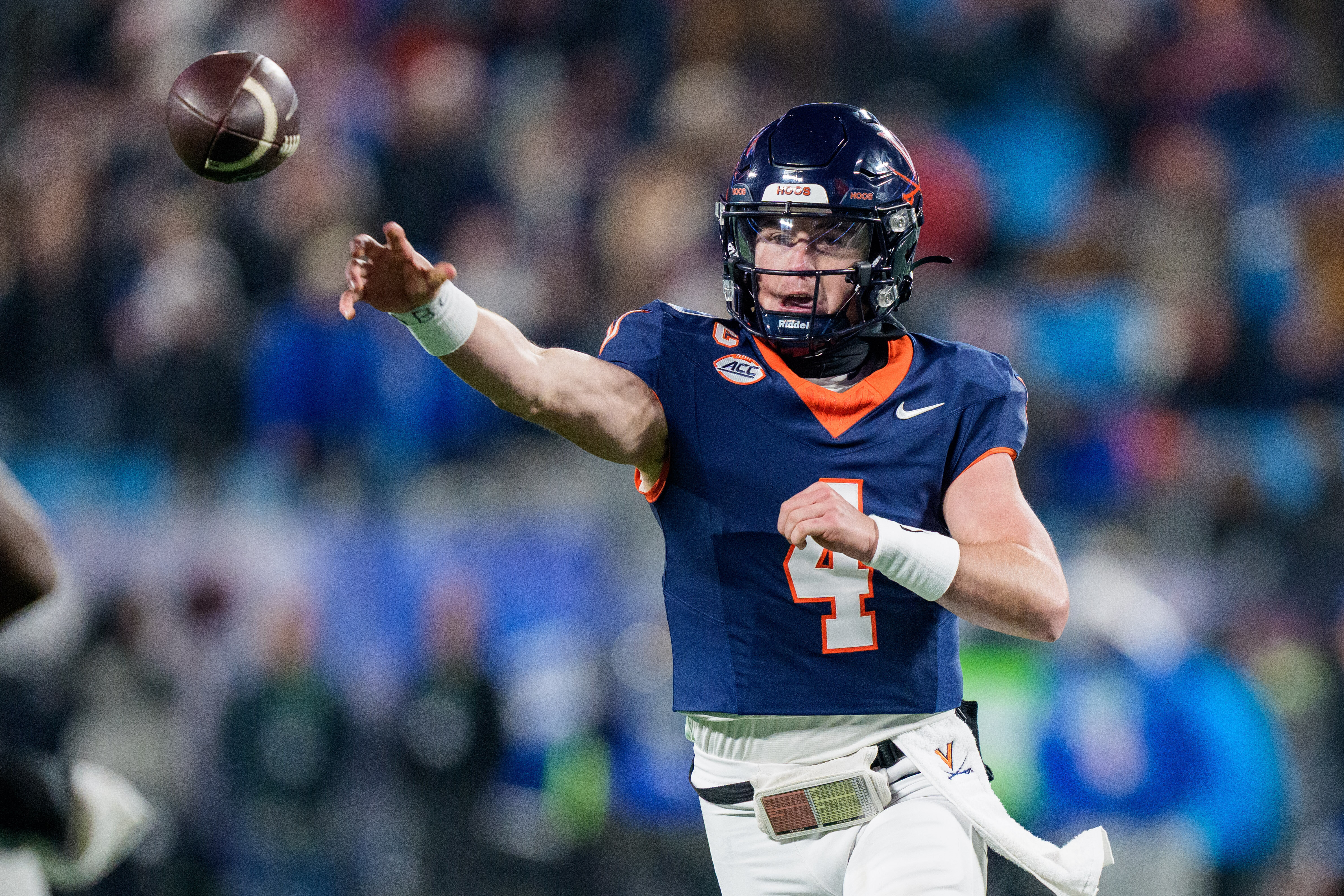 FILE - Virginia quarterback Chandler Morris (4) passes the ball during the Atlantic Coast Conference championship NCAA college football game between Virginia and Duke, Dec. 6, 2025, in Charlotte, N.C.