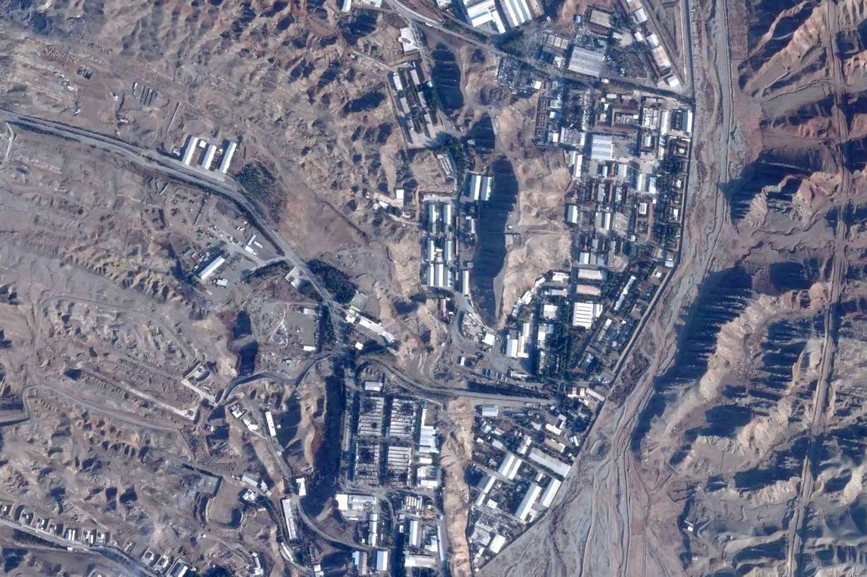 This satellite image from Planet Labs PBC shows damage after airstrikes targeting Iran's Parchin military base outside of Tehran, Iran, March 6. President Donald Trump on Wednesday said the U.S. goals in Iran were nearly complete, but did not give a timeline to wind down the conflict.