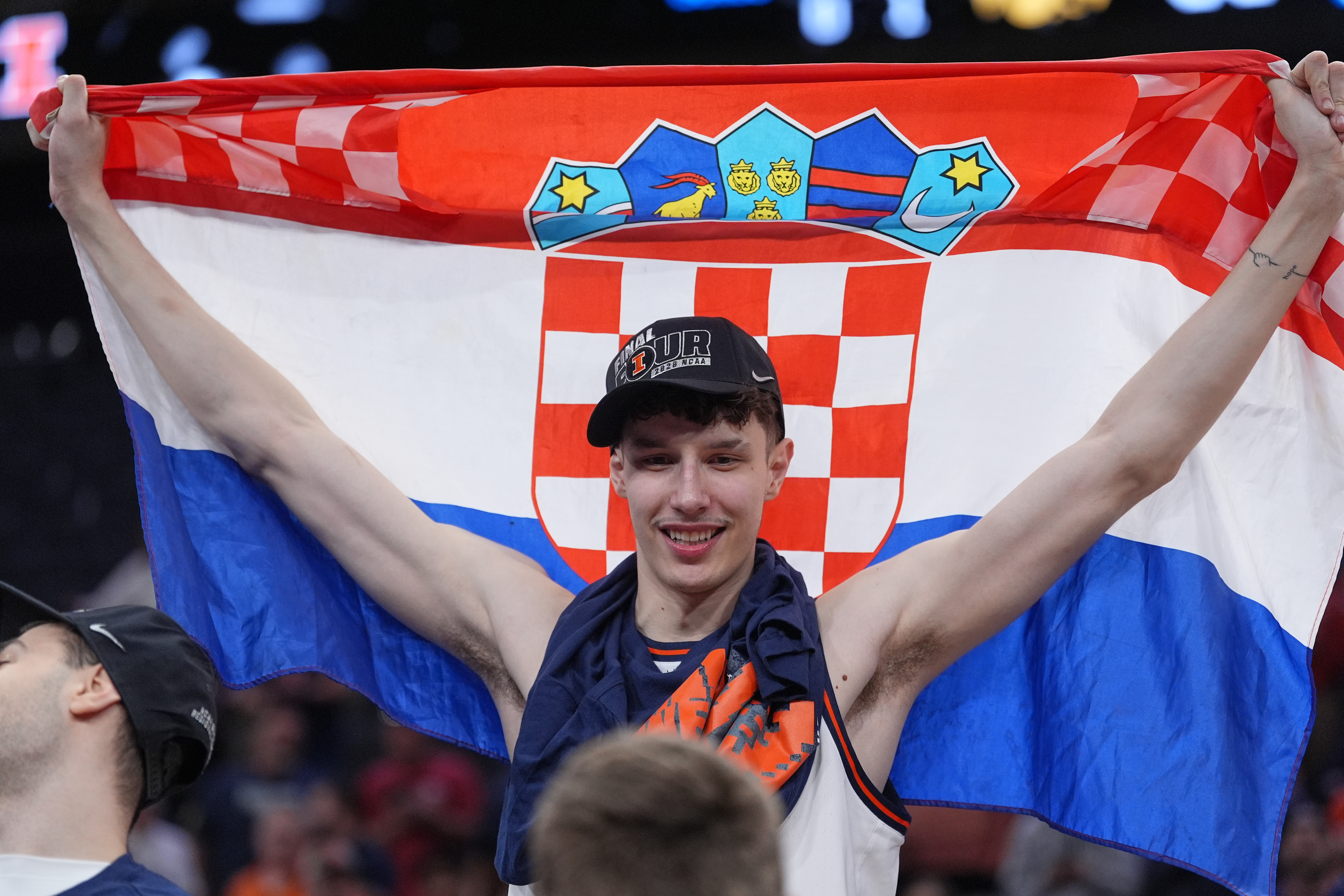 Illinois' Zvonimir Ivisic celebrates after an Elite Eight game against Iowa in the NCAA college basketball tournament Saturday, March 28, 2026, in Houston.