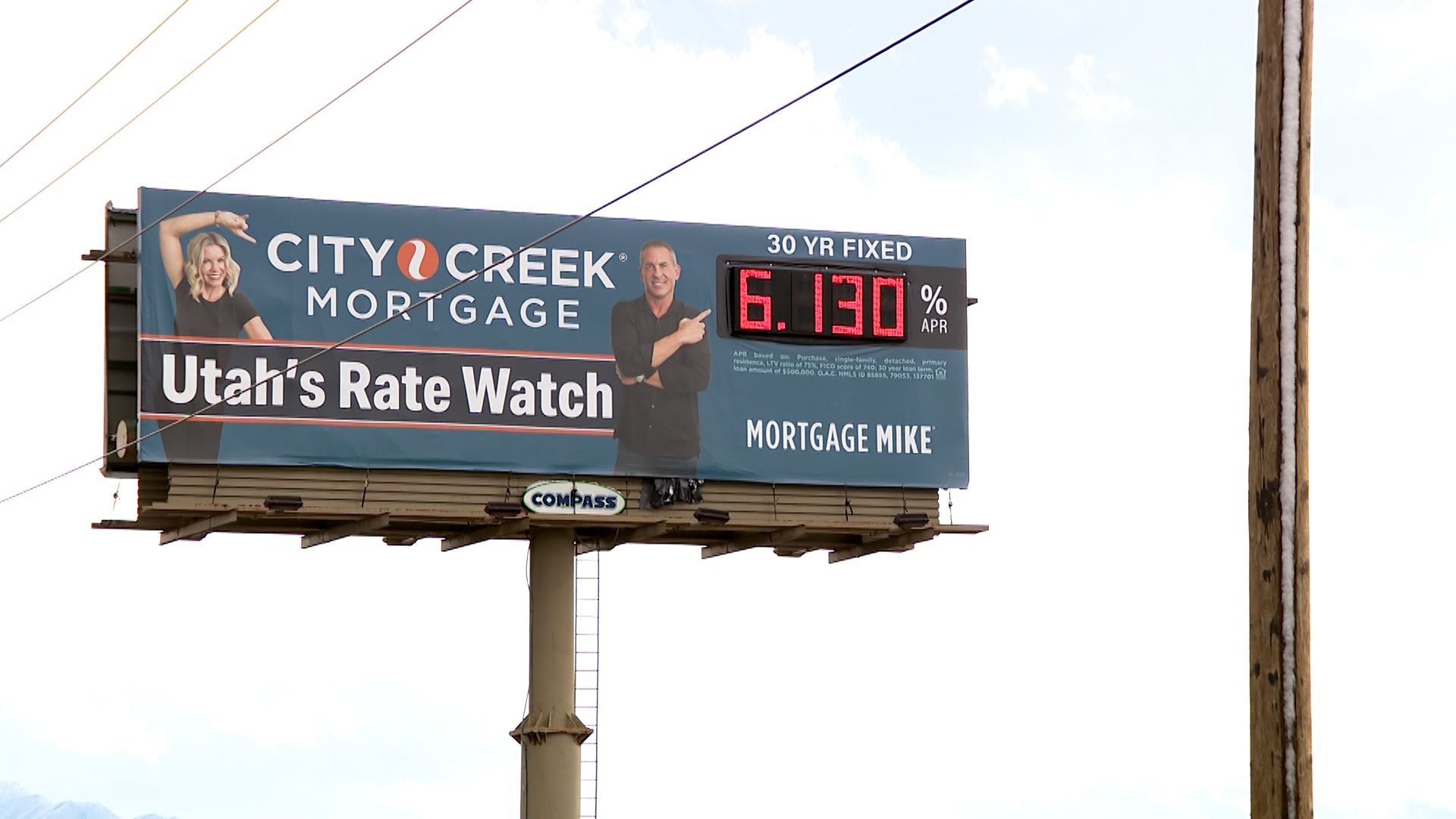 A sign advertising a mortgage rate is pictured near Lehi on Thursday.