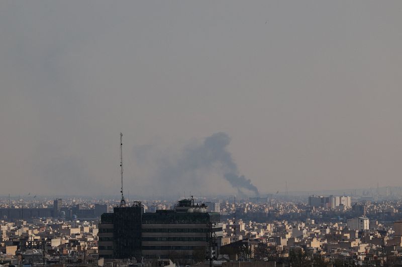Smoke rises following a strike, amid the U.S.-Israeli conflict with Iran, in Tehran, Iran, Wednesday. President Donald Trump proposed a "historic" defense budget for 2027 on Friday, which includes more aid for the war in Iran.