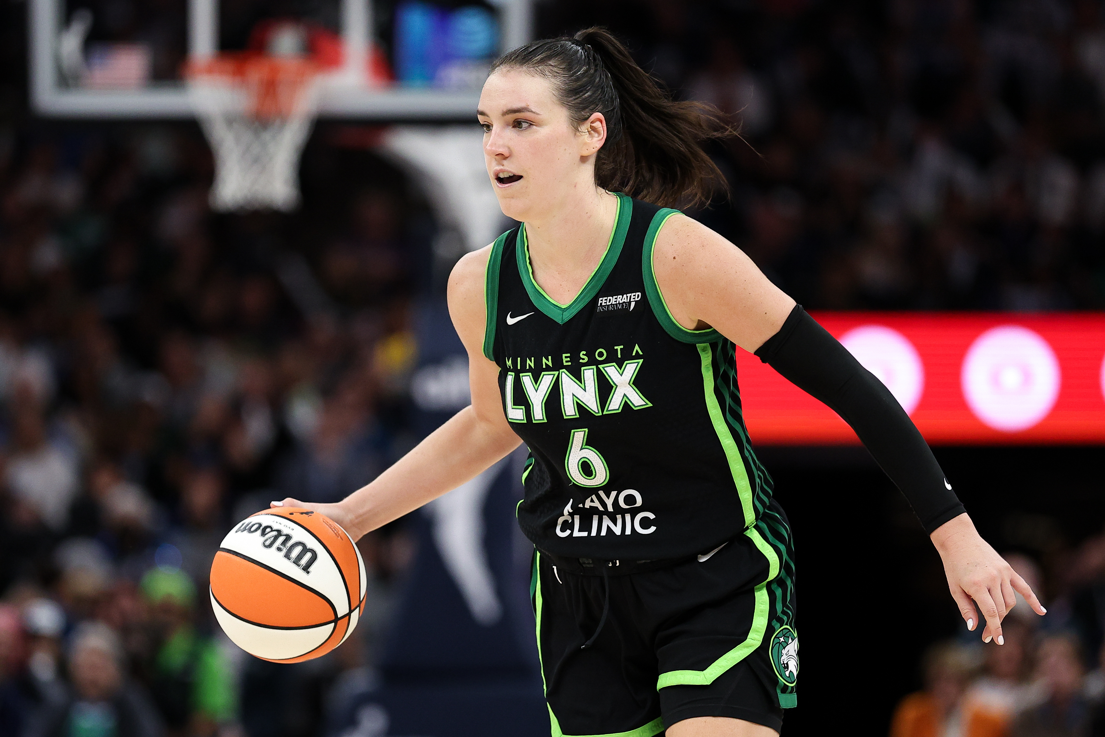 FILE - Minnesota Lynx forward Bridget Carleton (6) dribbles the ball up court against the Phoenix Mercury during the second half of Game 2 of a WNBA basketball playoff semifinals series Tuesday, Sept. 23, 2025, in Minneapolis.