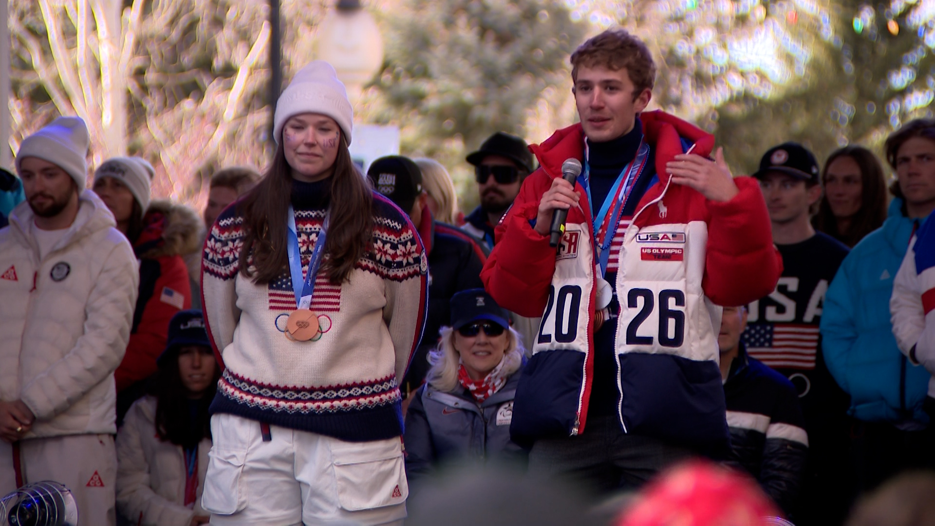 Olympians Ashley Farquharson and Casey Dawson address the crowd in Park City after a welcome home parade, Friday. Both hope to be involved in some way with the 2034 Winter Olympics in Utah.