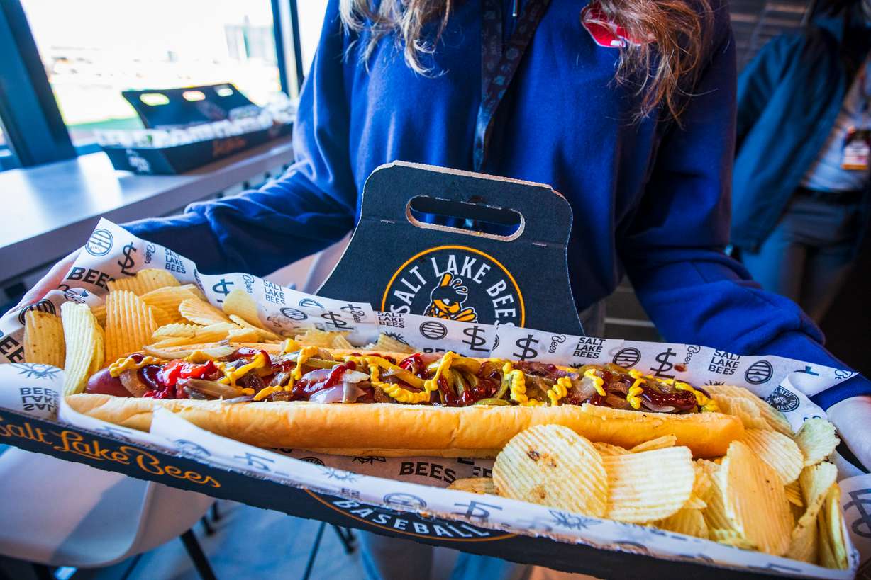 The "Dinger Dog" is displayed during a Salt Lake Bees game at America First Square in South Jordan on Friday. The massive, 18-inch hot dog in among the largest sold at ballparks in the country.