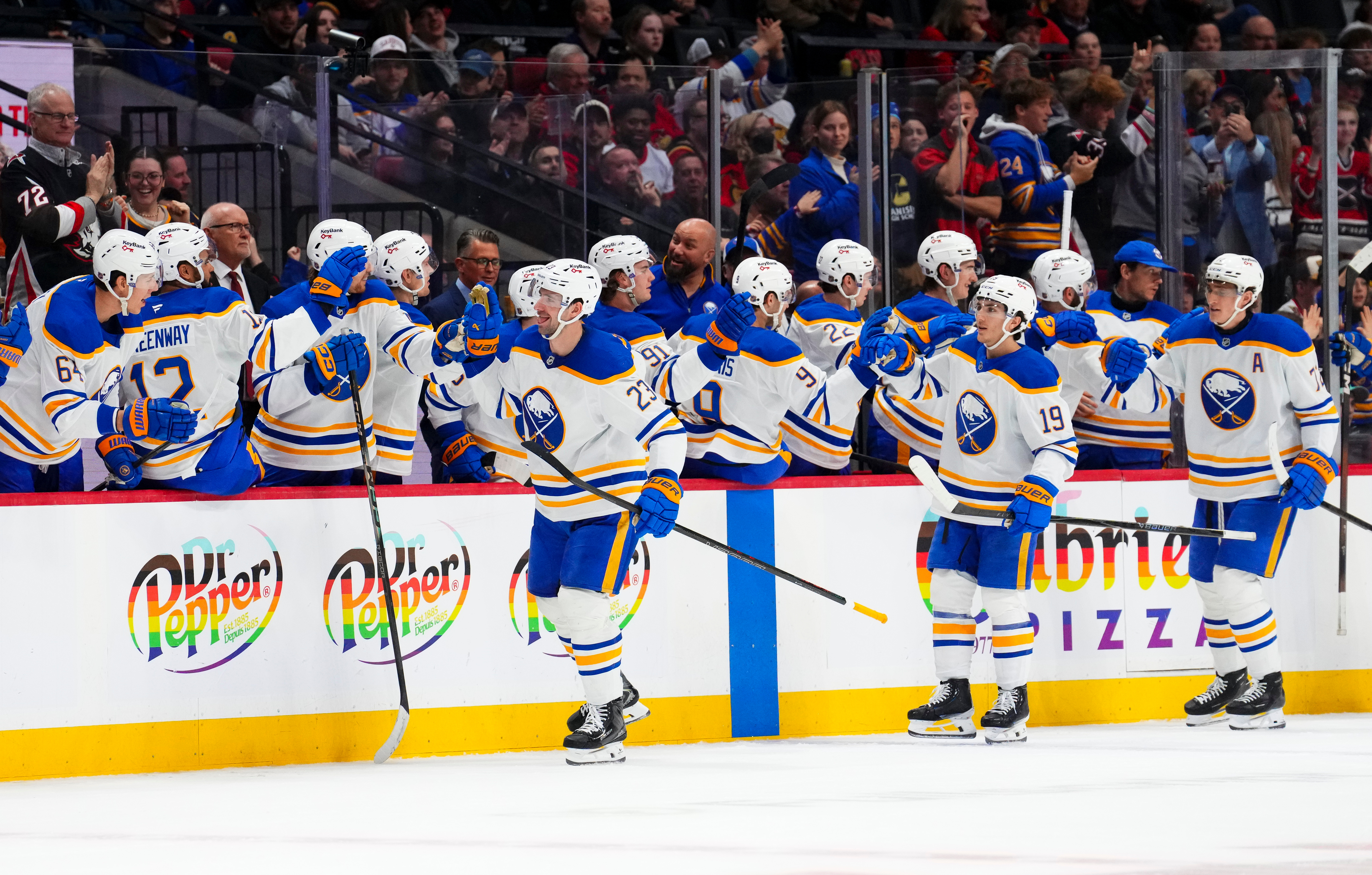 Buffalo Sabres' Mattias Samuelsson (23), front left, celebrates his goal with the bench against the Ottawa Senators during the second period of an NHL hockey game in Ottawa on Thursday, April 2, 2026.