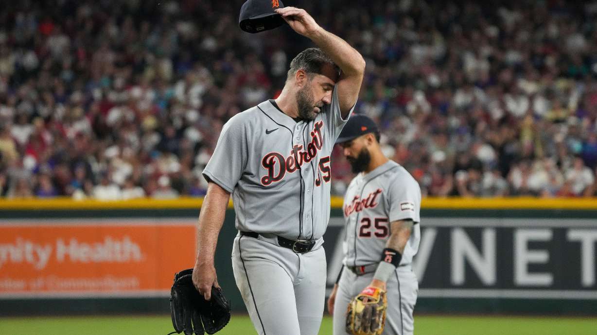 Detroit Tigers pitcher Justin Verlander wipes his brow as he walks off the field during the fourth inning of an opening-day baseball game against the Arizona Diamondbacks Monday, March 30, 2026, in Phoenix.