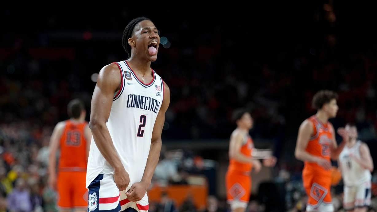 UConn guard Silas Demary Jr. celebrates after the second half of an NCAA college basketball tournament semifinal game against Illinois at the Final Four, Saturday, April 4, 2026, in Indianapolis.