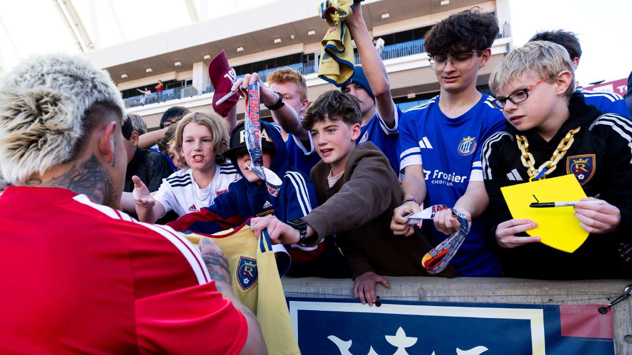Real Salt Lake midfielder Diego Luna (10) signs a jersey for a fan after Real Salt Lake defeated Sporting Kansas City 3-1 in an MLS game at America First Field in Sandy on Saturday, April 4, 2026.