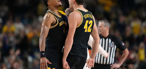 Michigan overpowers Arizona and reaches national title game with 91-73 win