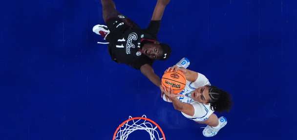 Staley embraces UCLA's Close ahead of title game, then smirks to the crowd after handshake drama