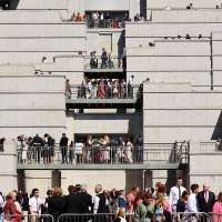 Man arrested after police say he stripped naked in front of general conference crowd