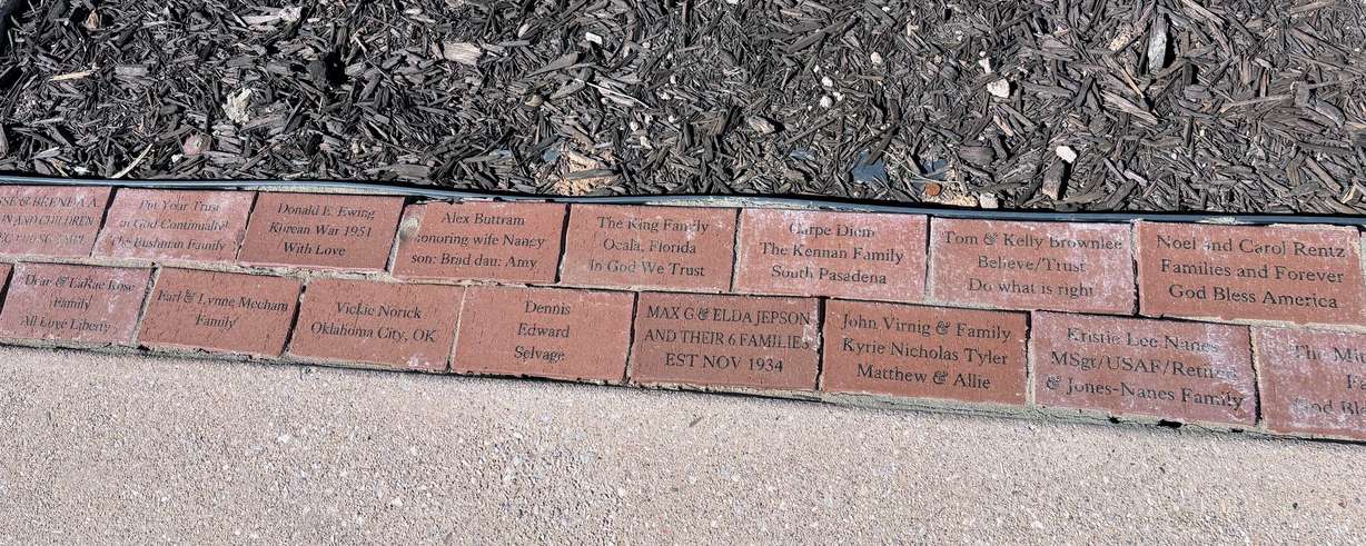 Commemorative bricks line 13 Colonies Plaza at Liberty Village outside Hurricane, Washington County.
