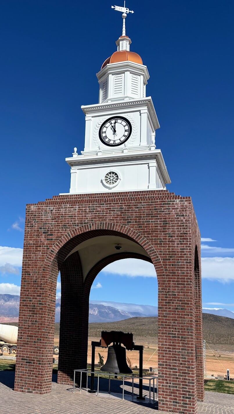 A replica of the Liberty Bell sits below the clock tower at Liberty Village outside Hurricane, Washington County.