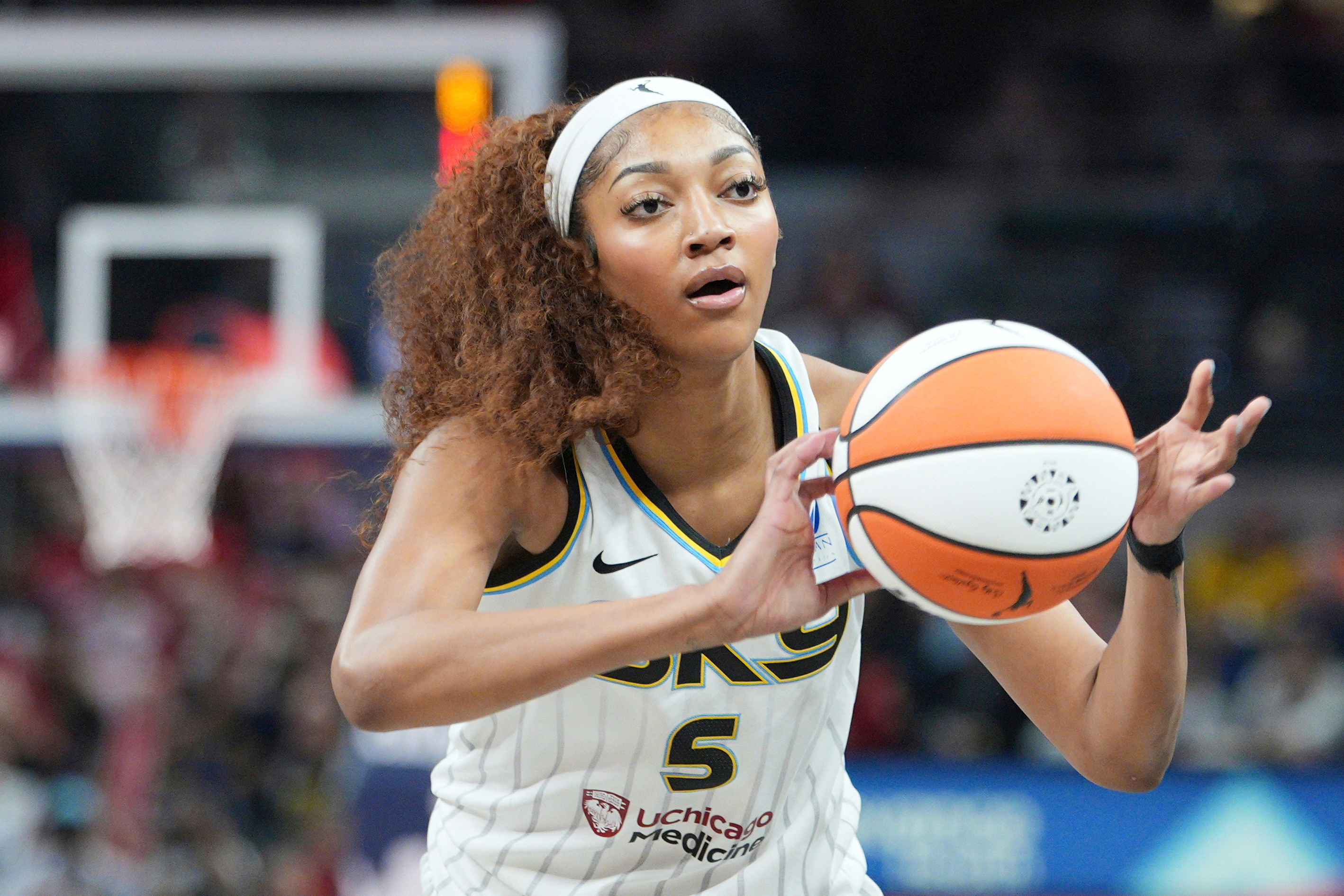 FILE - Chicago Sky forward Angel Reese (5) makes a pass during a WNBA basketball game against the Indiana Fever in Indianapolis, Saturday, May 17, 2025.
