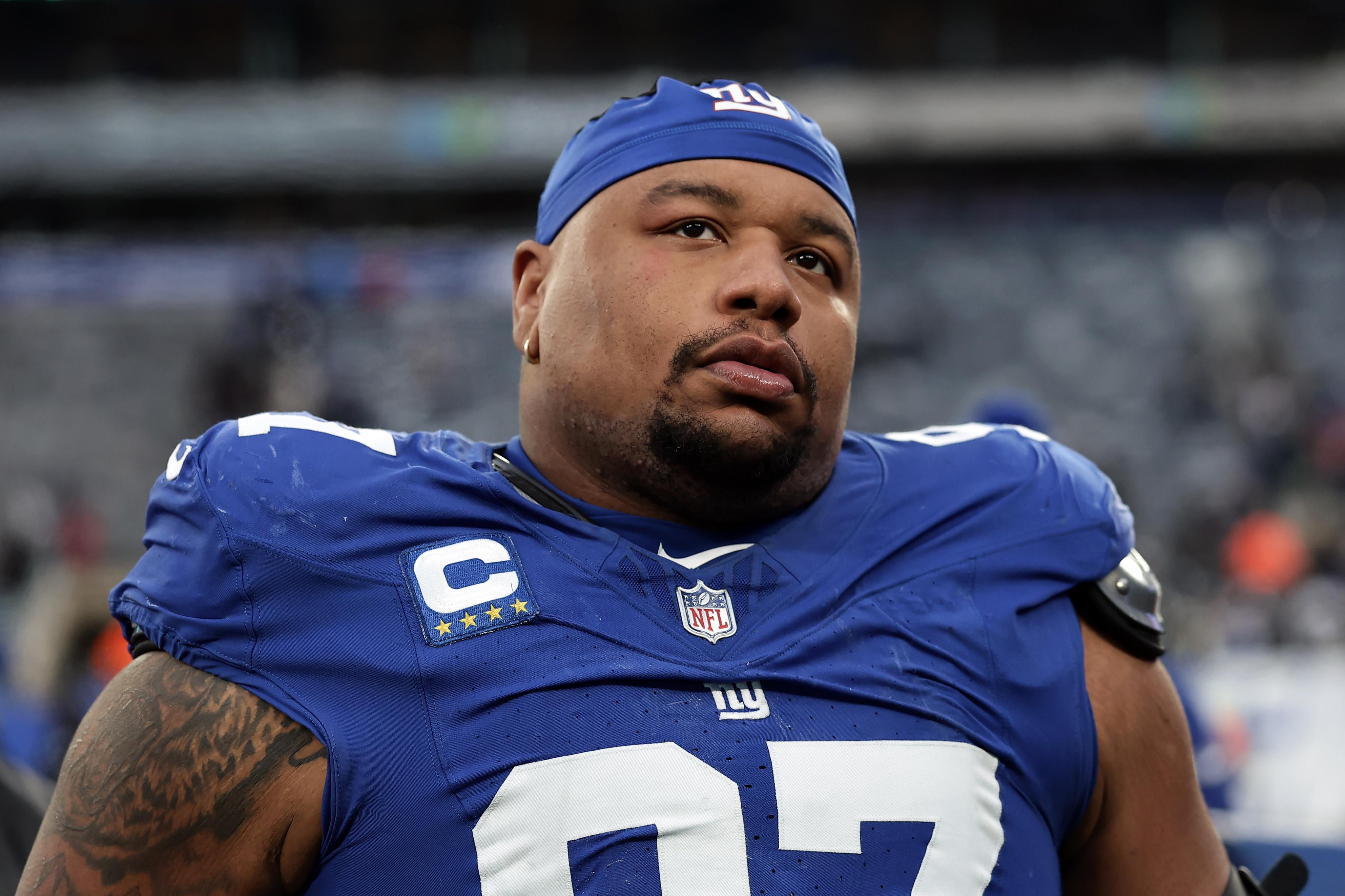 FILE - New York Giants defensive tackle Dexter Lawrence II (97) walks off the field after an NFL football game against the Dallas Cowboys, Sunday, Jan. 4, 2026, in East Rutherford, N.J.