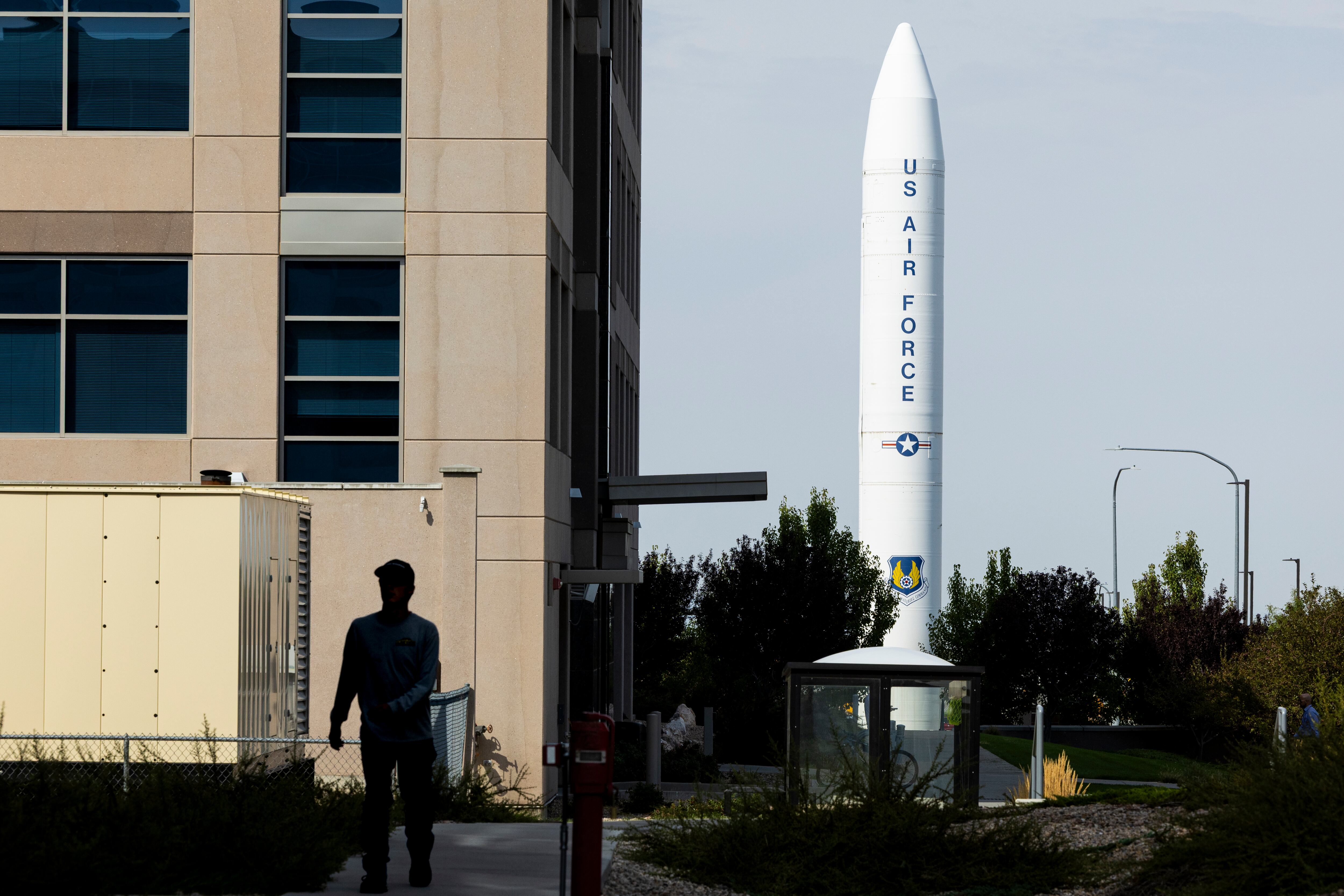 A person passes between buildings at the Falcon Hill Aerospace Research Park within Hill Air Force Base in Clearfield on Sept. 4, 2025.