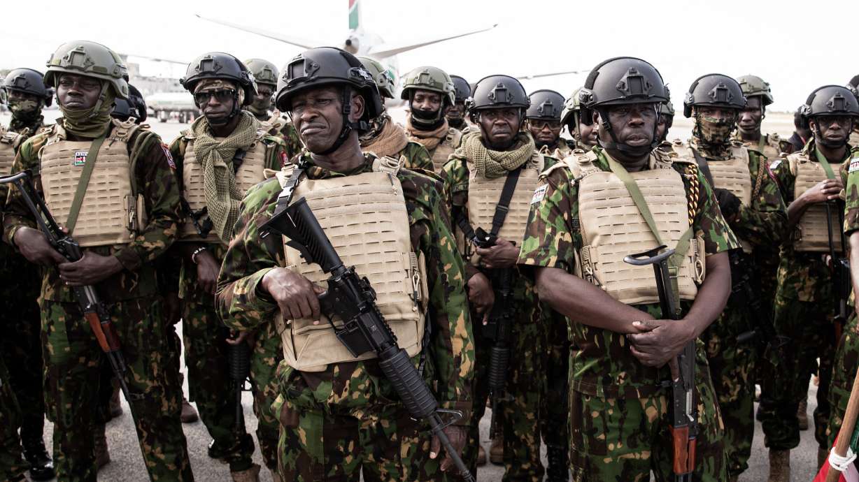 Kenyan police officers arrive at Toussaint Louverture International Airport in Port-au-Prince, Haiti, on Dec. 8, 2025, as part of a multinational force.