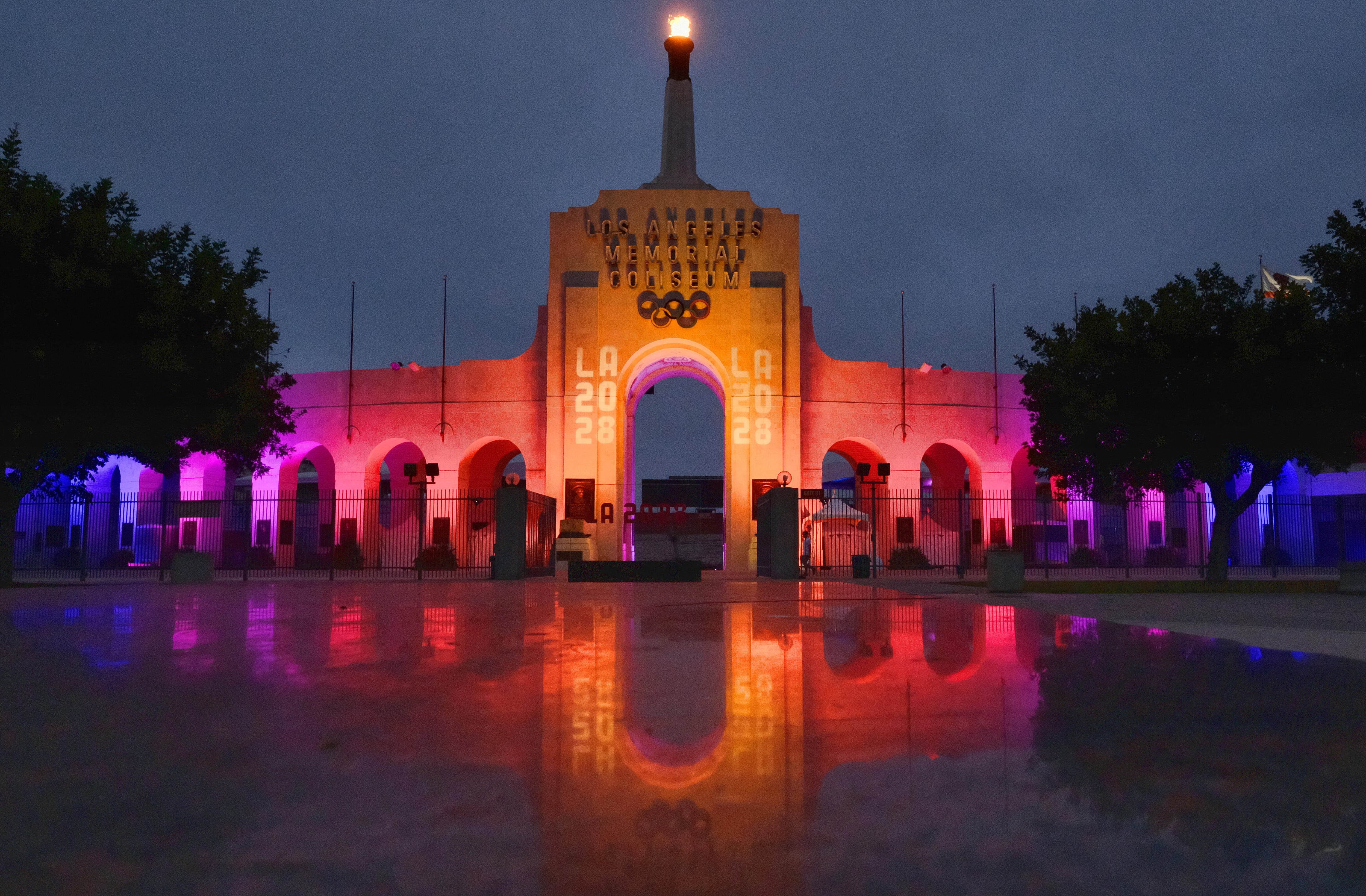 A blazing Olympic cauldron is seen at the Los Angeles Memorial Coliseum on Sept. 13, 2017.