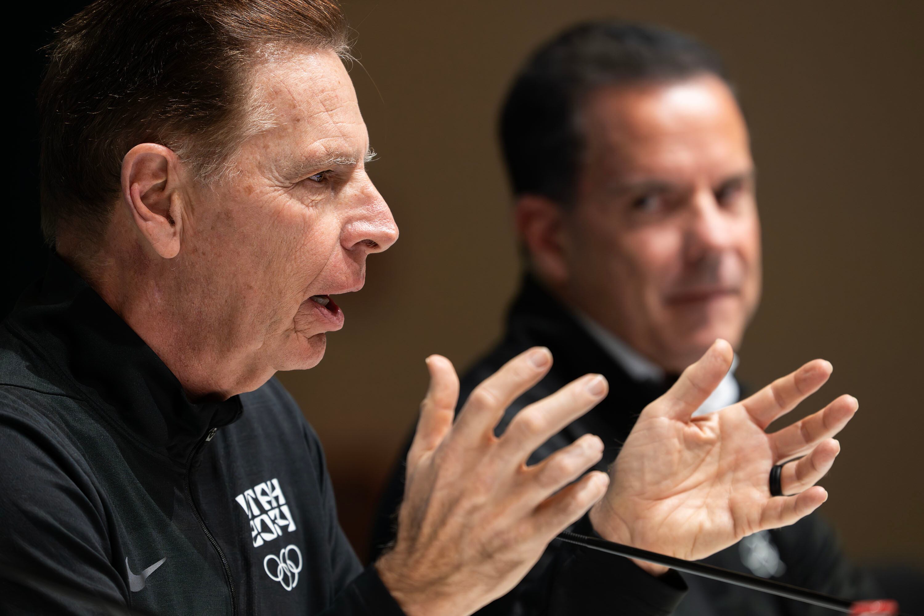 Fraser Bullock, executive chair and president of Olympic Winter Games Utah 2034 — joined by other 2034 Utah Winter Olympic Games organizers — speaks during a press conference in the main media center for the 2026 Milan Cortina Winter Olympics in Milan, Italy, on Feb. 10.